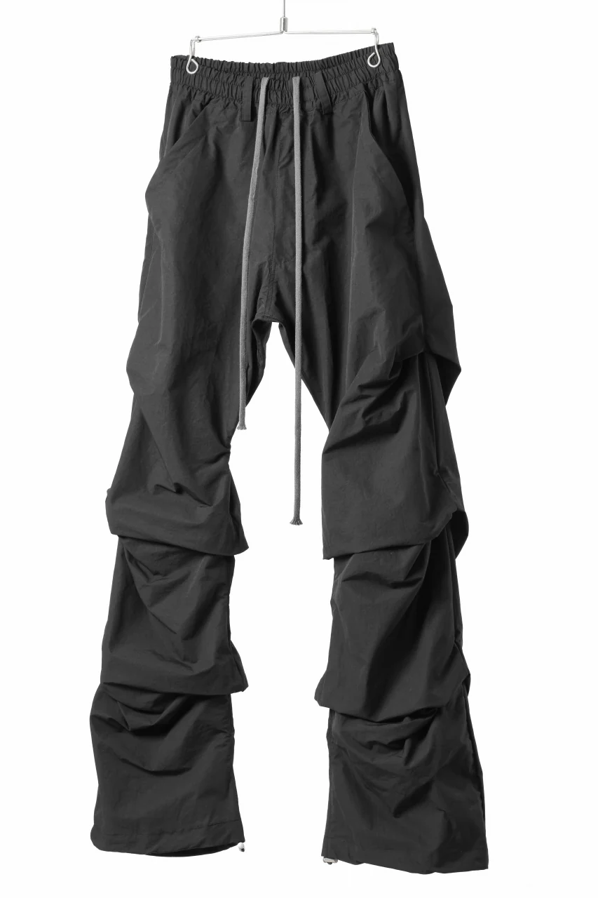 A.F ARTEFACT TUCK VOLUME BAGGY PANTS / SMOOTH NYLON (BLACK) - Image 2