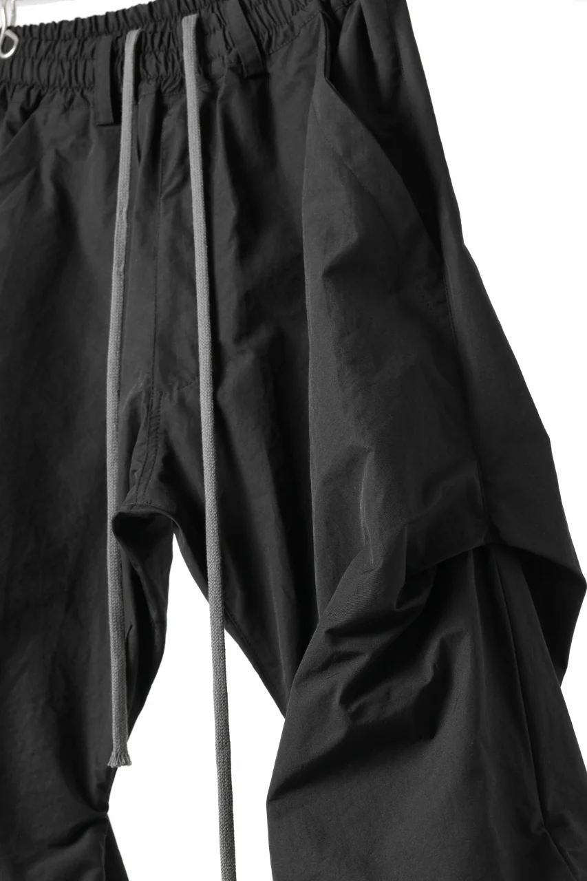 A.F ARTEFACT TUCK VOLUME BAGGY PANTS / SMOOTH NYLON (BLACK) - Image 6