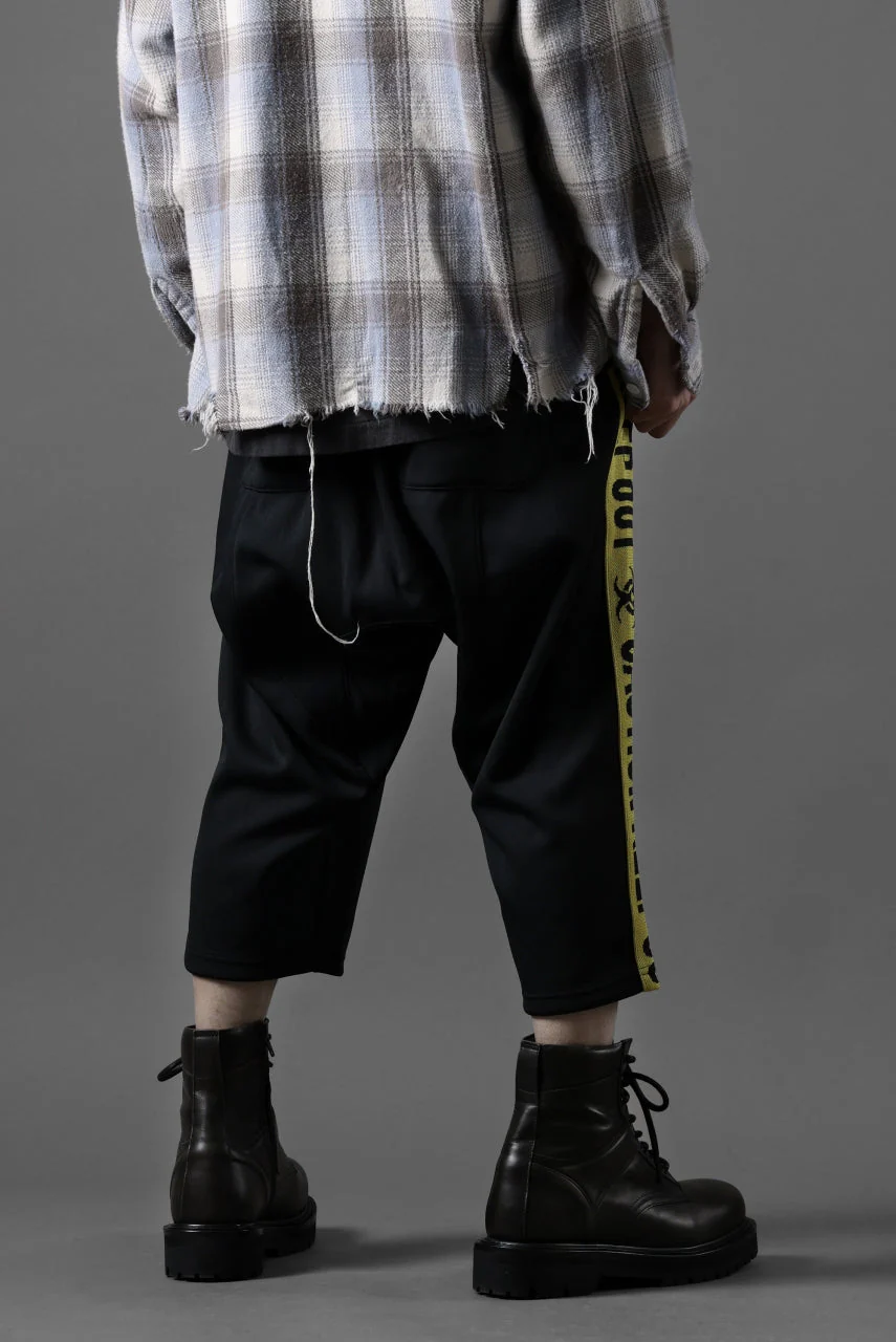 beauty : beast ”KEEP OUT” SARROUEL CROPPED TRACK PANTS (BLACK x YELLOW) - Image 12