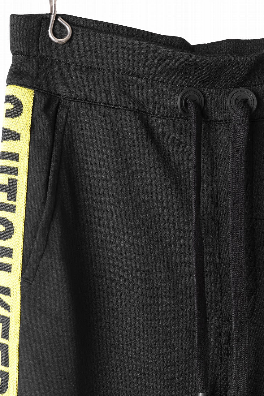 beauty : beast ”KEEP OUT” SARROUEL CROPPED TRACK PANTS (BLACK x YELLOW) - Image 4