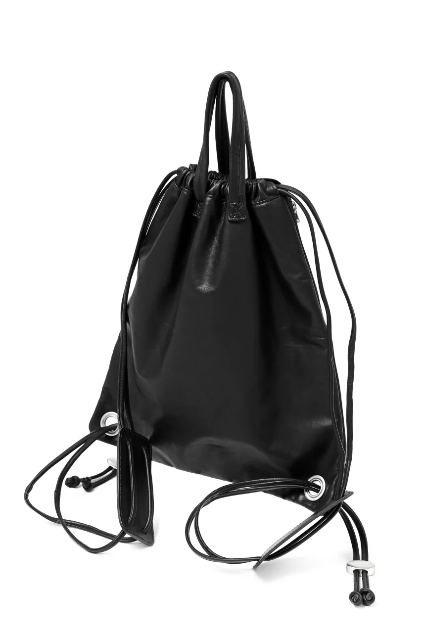 ISAMU KATAYAMA BACKLASH DRAWSTRING BACKPACK / MONOCHROME LUXURY STEER (BLACK) - Image 11