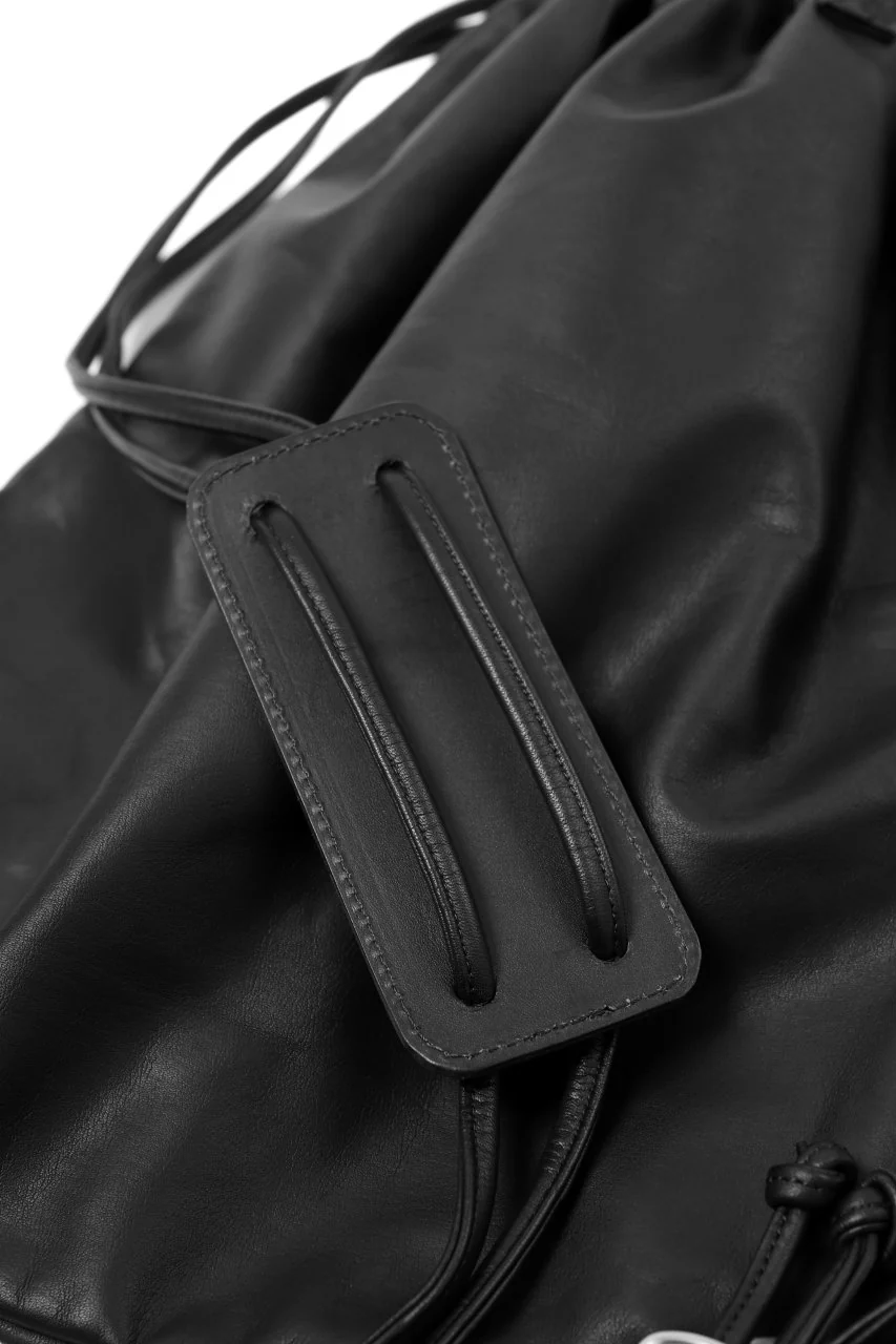 ISAMU KATAYAMA BACKLASH DRAWSTRING BACKPACK / MONOCHROME LUXURY STEER (BLACK) - Image 16