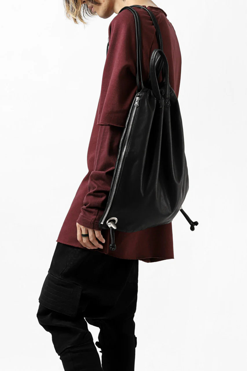 ISAMU KATAYAMA BACKLASH DRAWSTRING BACKPACK / MONOCHROME LUXURY STEER (BLACK) - Image 26