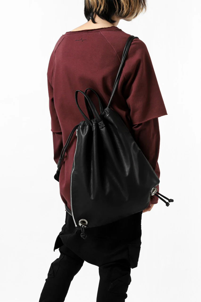 ISAMU KATAYAMA BACKLASH DRAWSTRING BACKPACK / MONOCHROME LUXURY STEER (BLACK) - Image 27