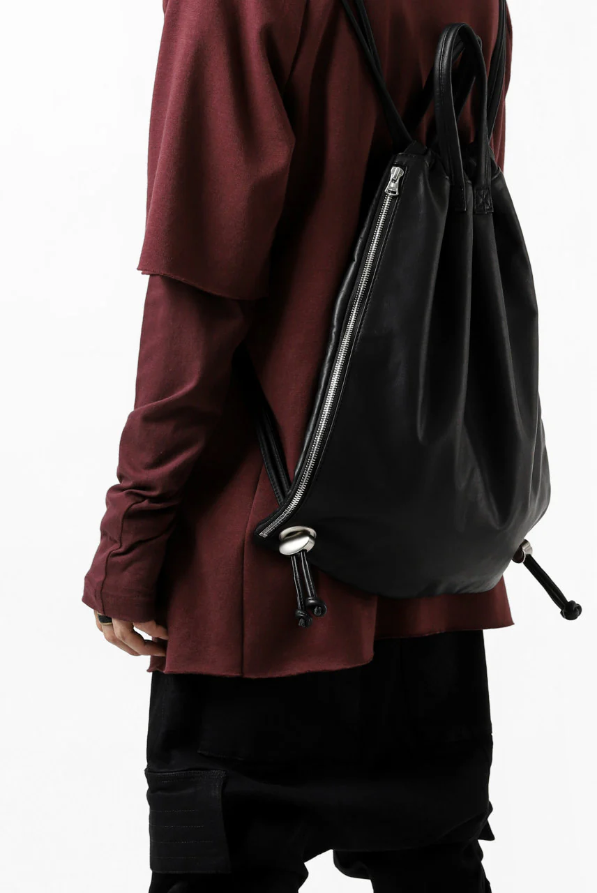 ISAMU KATAYAMA BACKLASH DRAWSTRING BACKPACK / MONOCHROME LUXURY STEER (BLACK) - Image 31