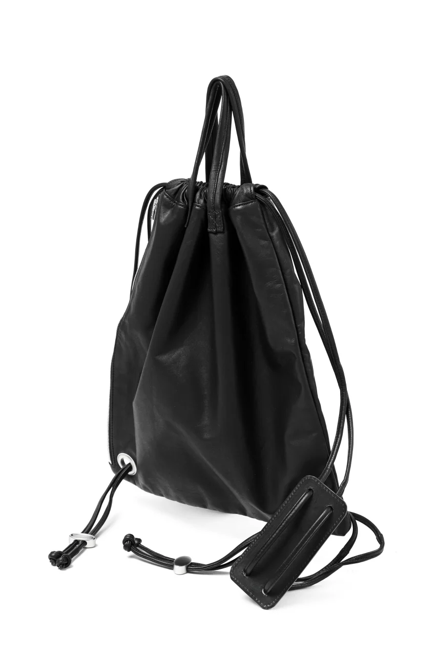 ISAMU KATAYAMA BACKLASH DRAWSTRING BACKPACK / MONOCHROME LUXURY STEER (BLACK) - Image 9